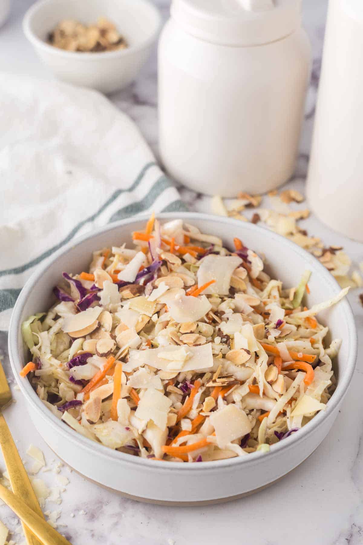 cabbage salad recipe in a white bowl.