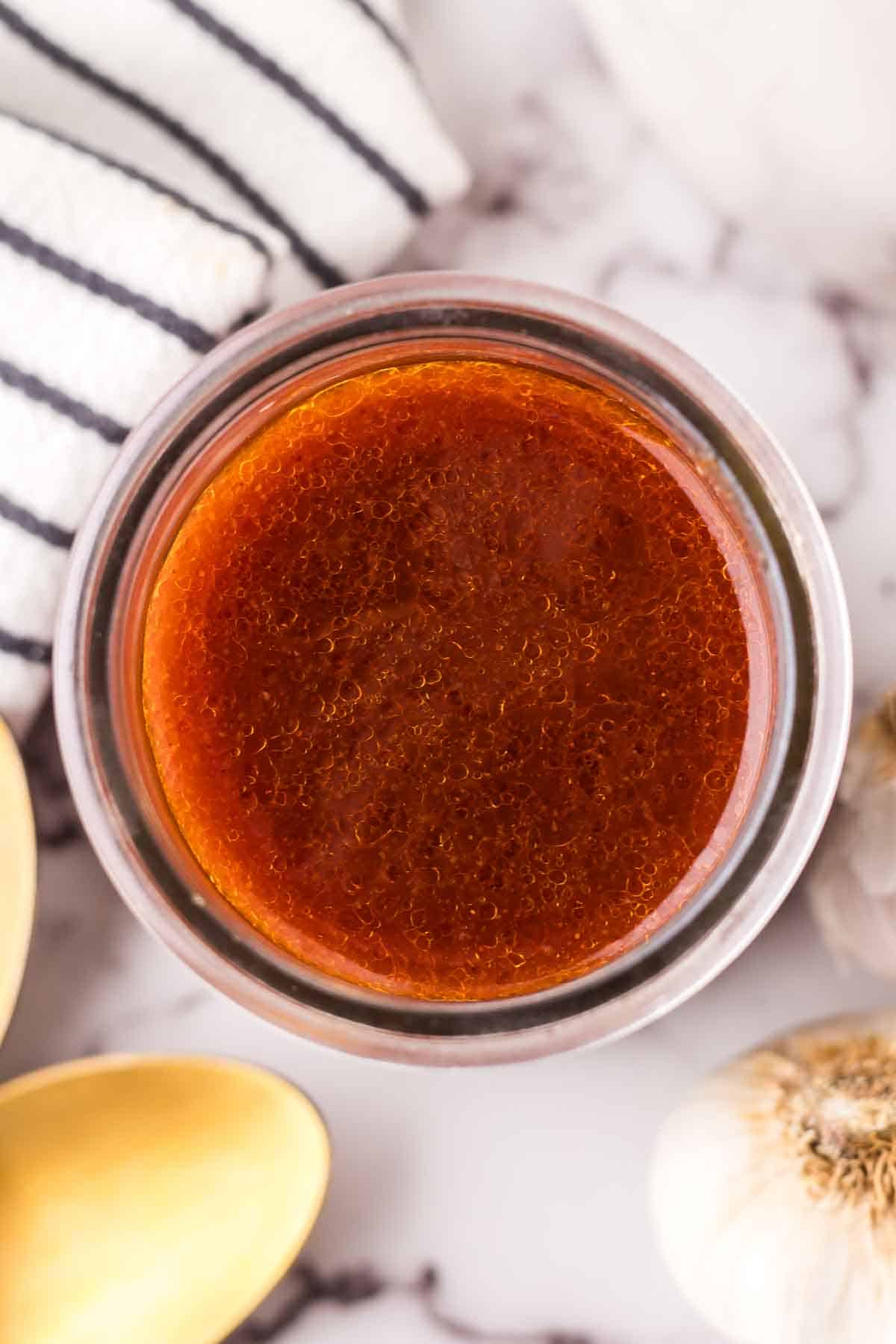 small glass jar with Catalina dressing recipe.
