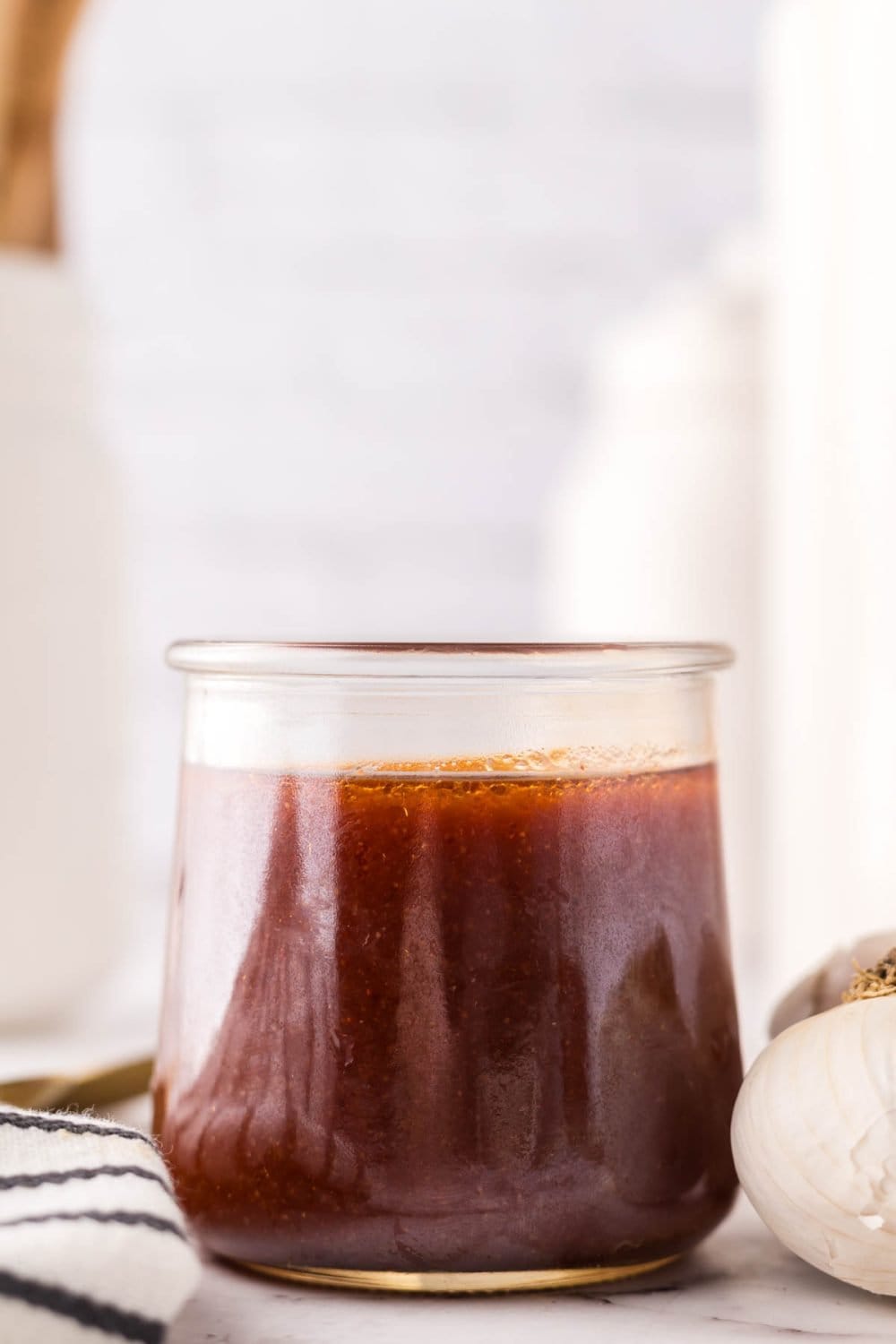 small glass jar with Catalina dressing recipe.