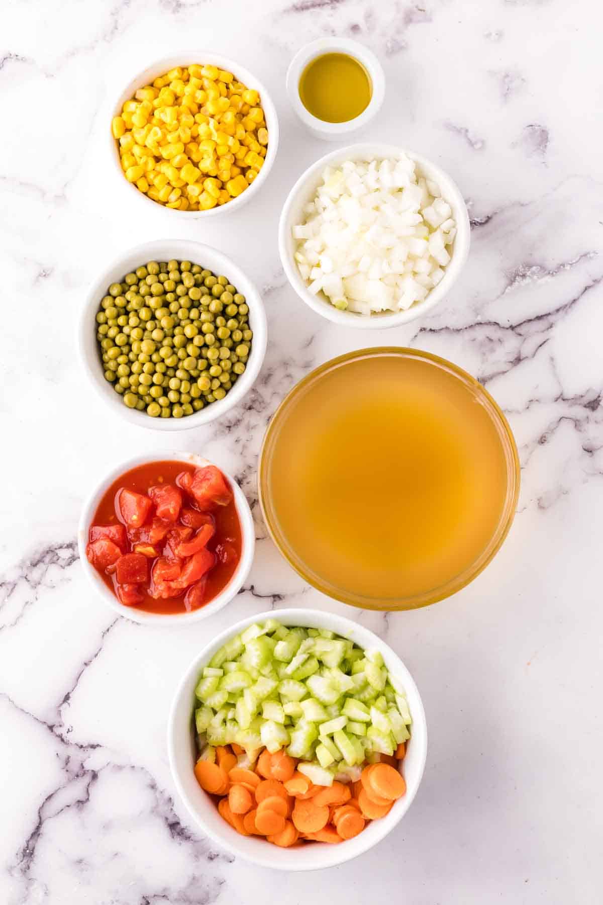 Ingredients in bowls for vegetable soup.