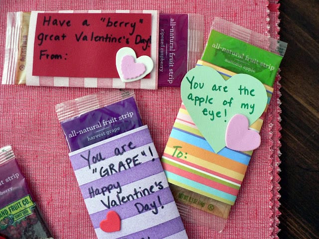 Fruit strips with cute sayings and heart-shaped foam stickers.