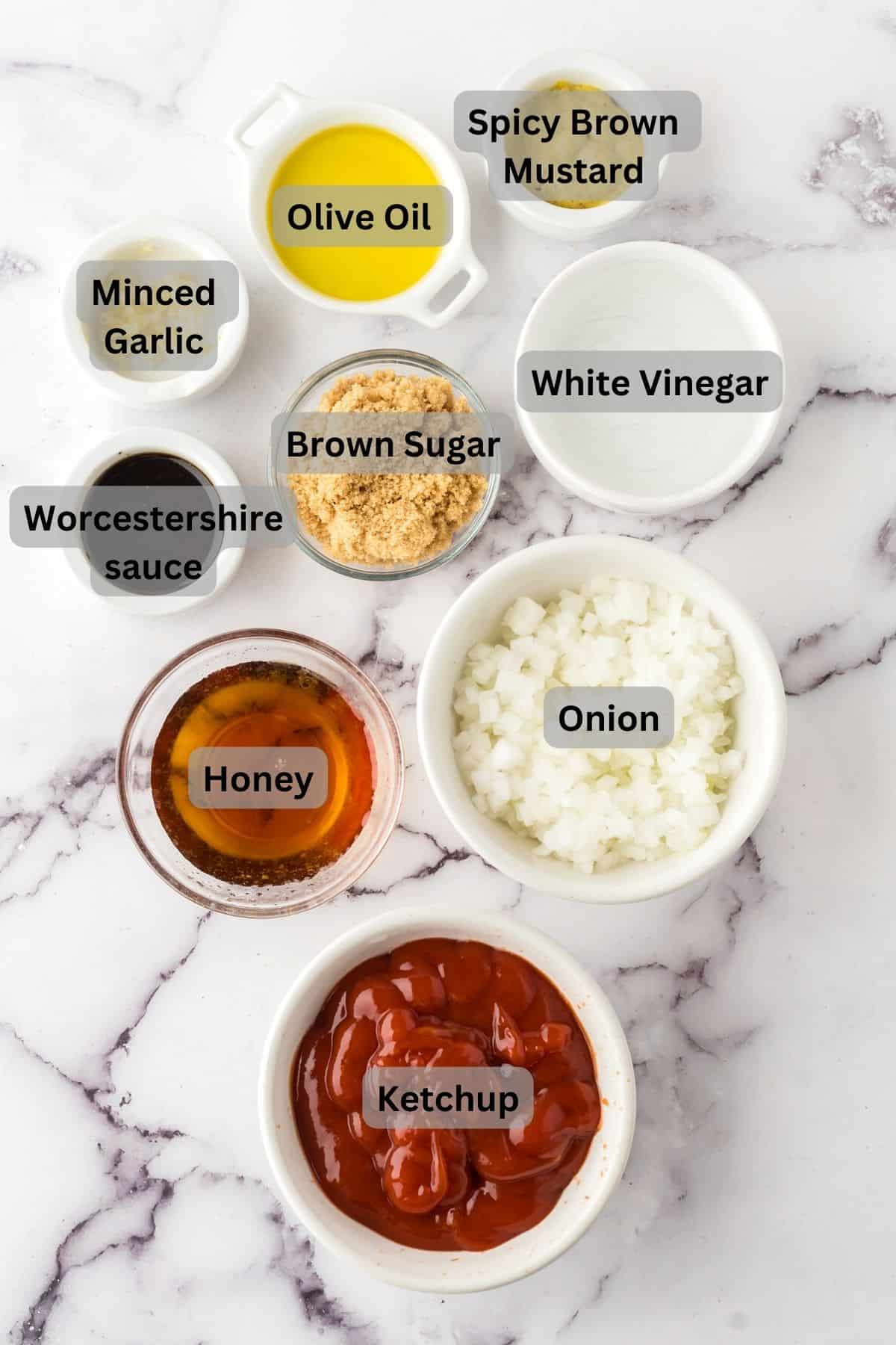 portion bowls each with digitally labeled raw ingredients to make barbecue sauce recipe.