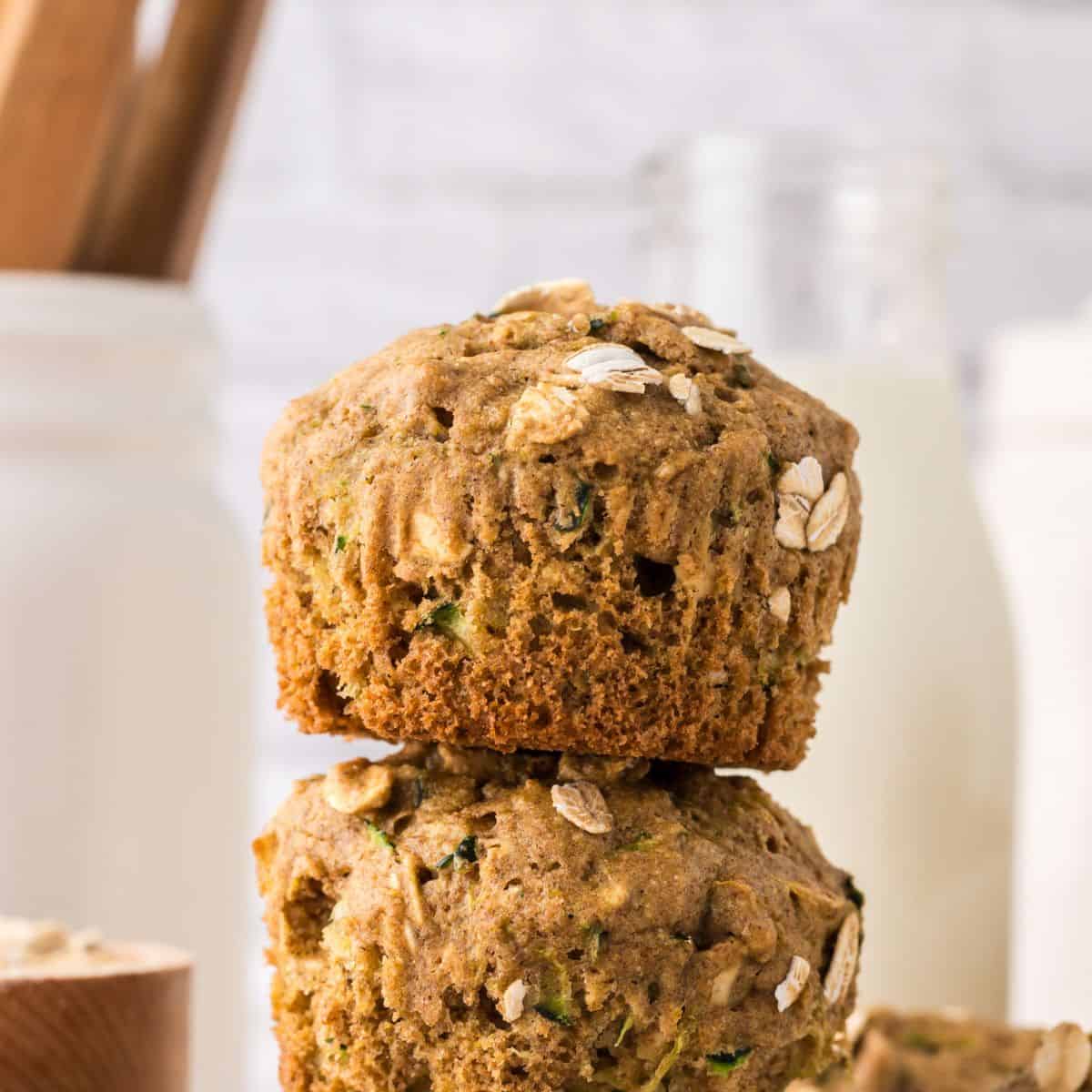stack of whole grain zucchini muffins.