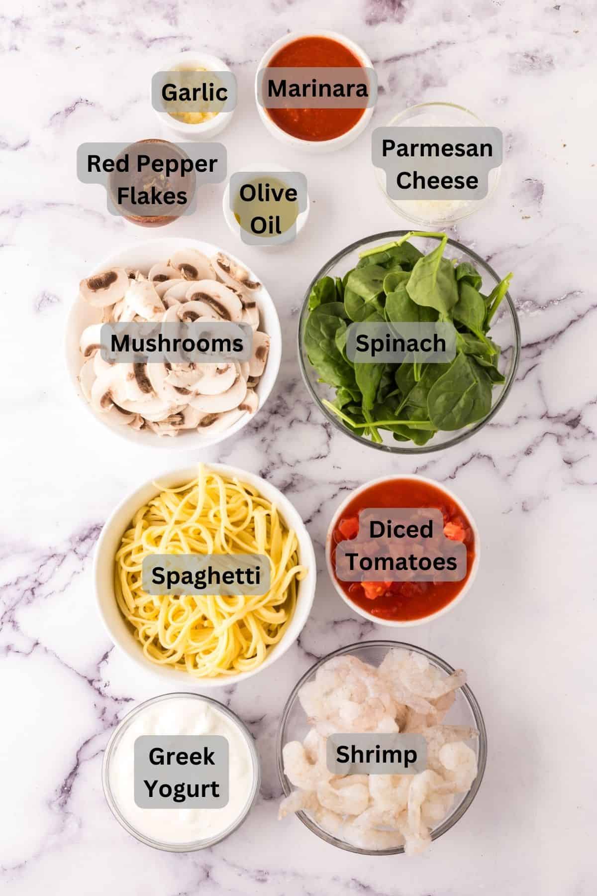 portion bowls each with digitally labeled raw ingredients to make linguine rosa with shrimp.