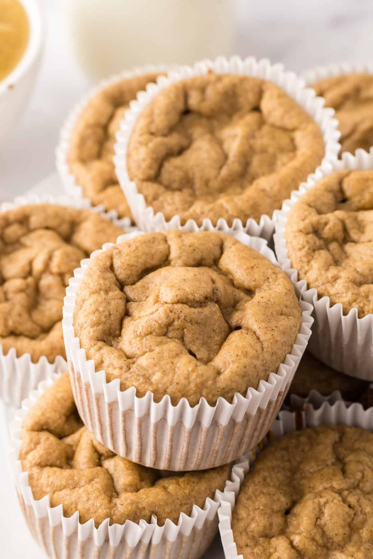 Stack of apple cinnamon muffins.