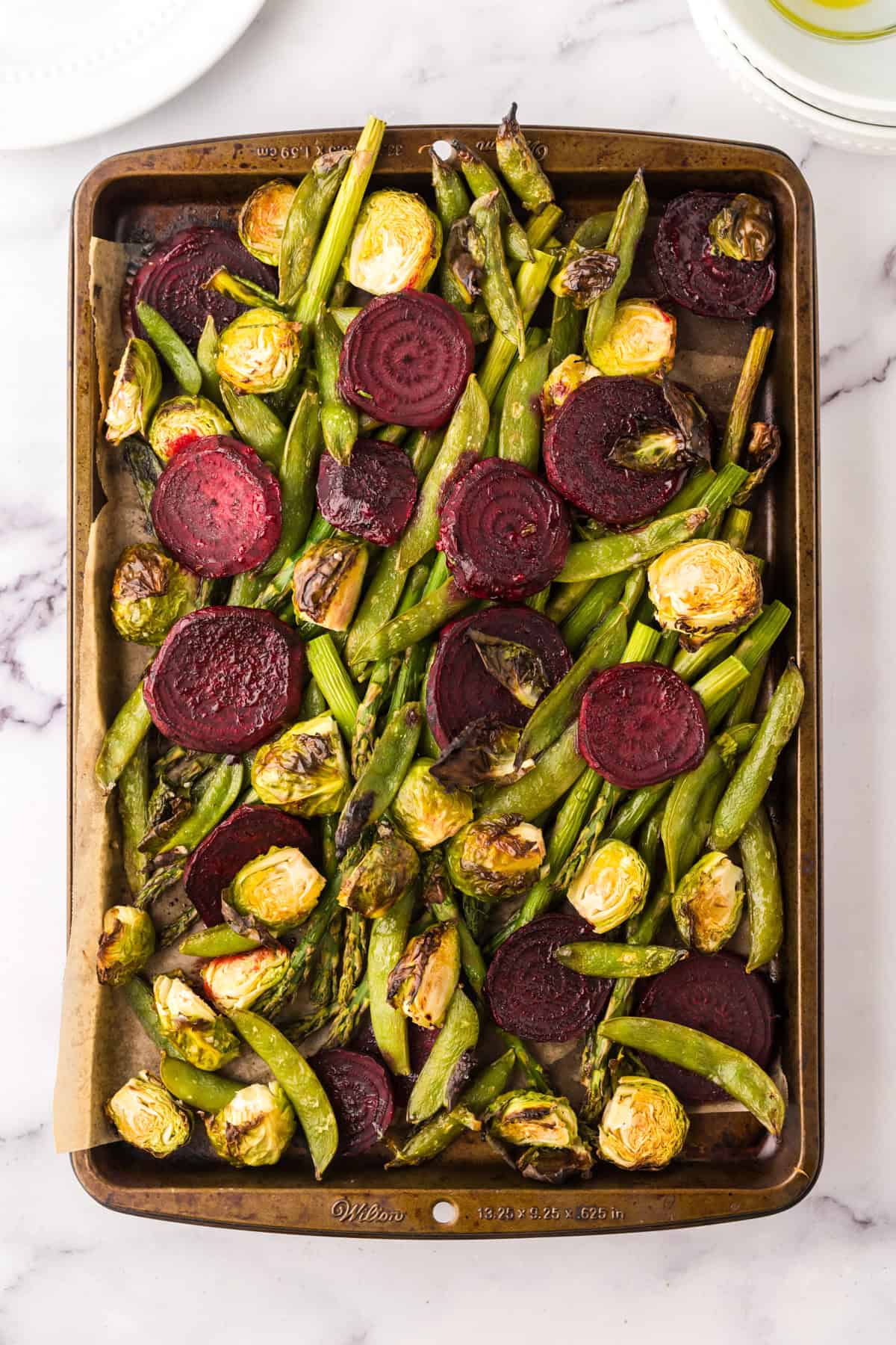 Roasted Spring Vegetables Recipe on a baking dish.