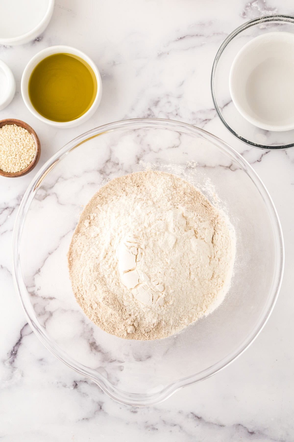 clear mixing bowl in the process of making simple lavish crackers.