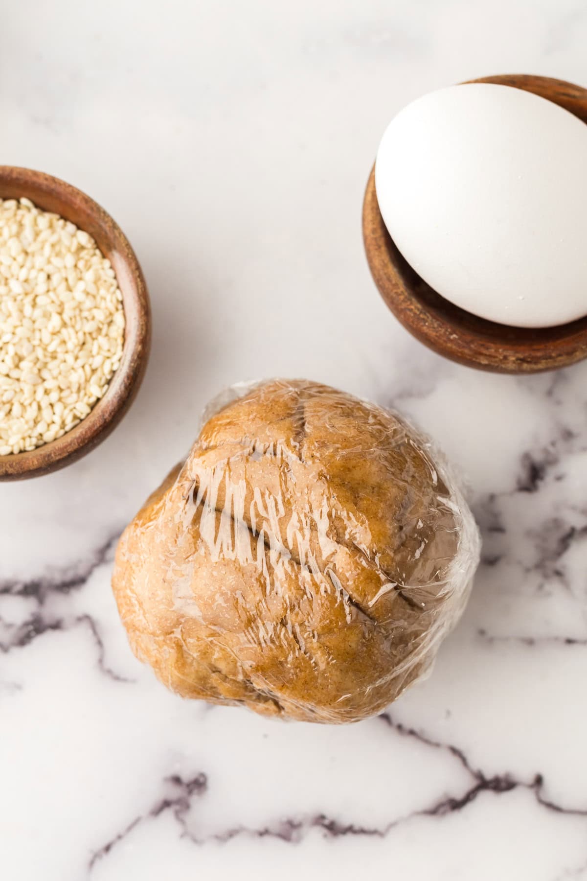 lavash bread dough wrapped in plastic.