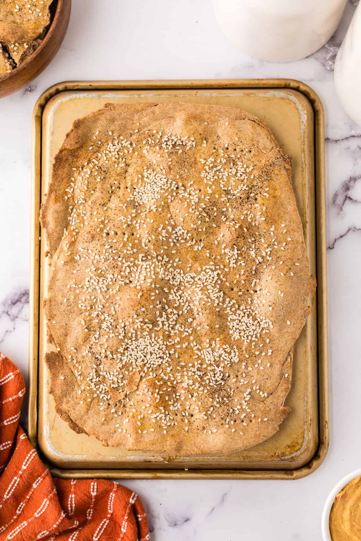 simple lavish bread cracker on a baking sheet.
