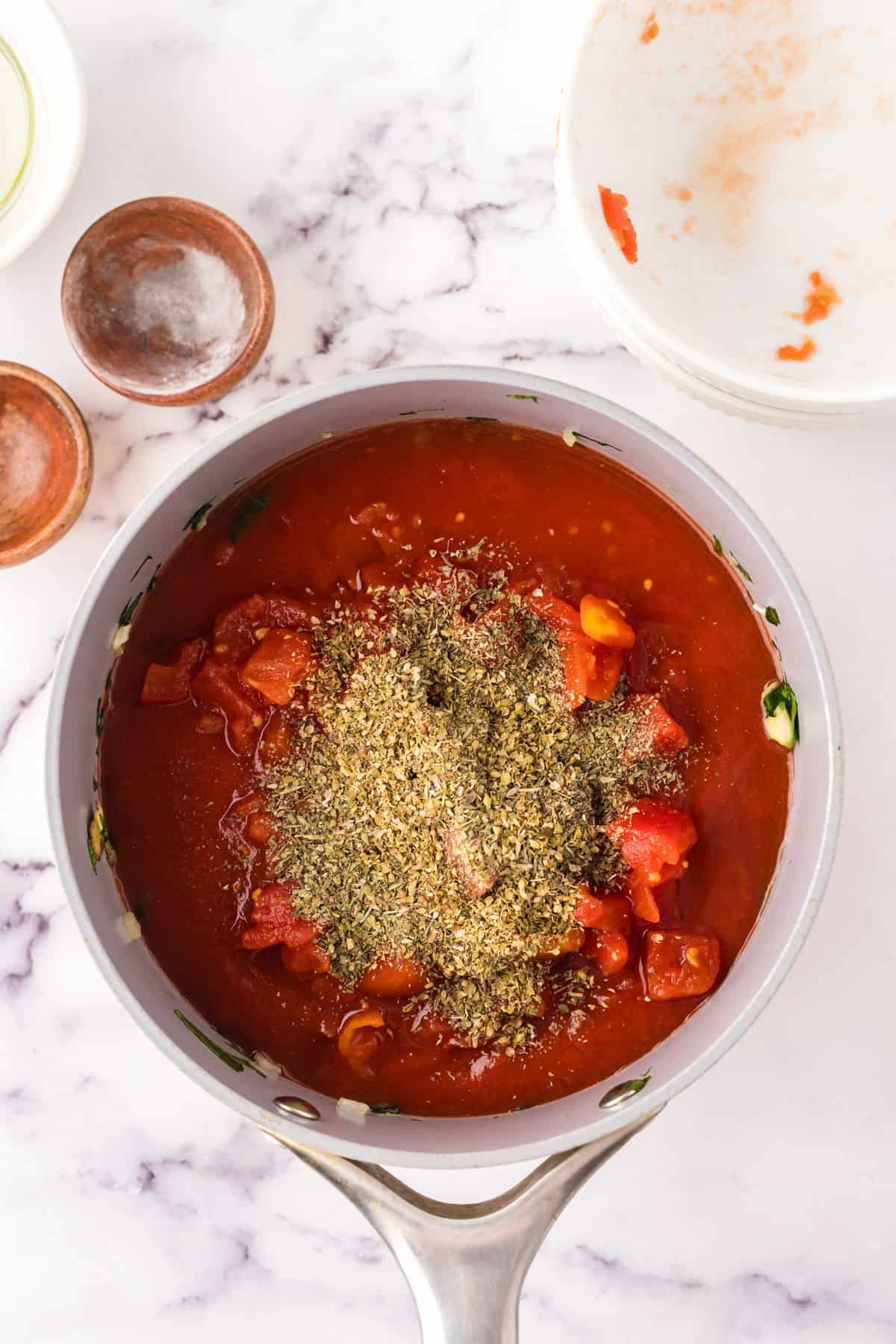 pot in the process of making spinach mushroom marinara.
