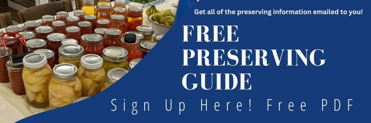 Jars of preserved fruits and vegetables are displayed on a table. Text reads: Free Preserving Guide. Sign Up Here! Free PDF. A call to action encourages getting more information via email.