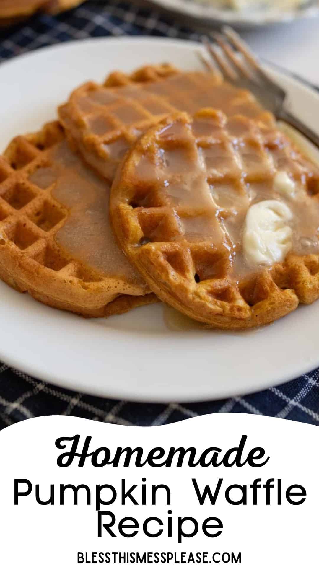 Two homemade pumpkin waffles topped with butter and syrup on a white plate, placed on a blue checkered cloth. A fork is in the background. The text reads Homemade Pumpkin Waffle Recipe.